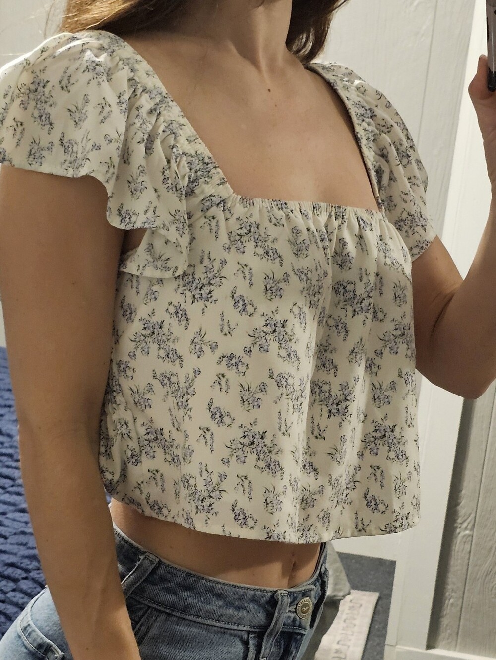 Kittenish White Blouse with Blue Floral Ruffles